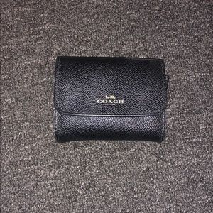 Black leather coach wallet